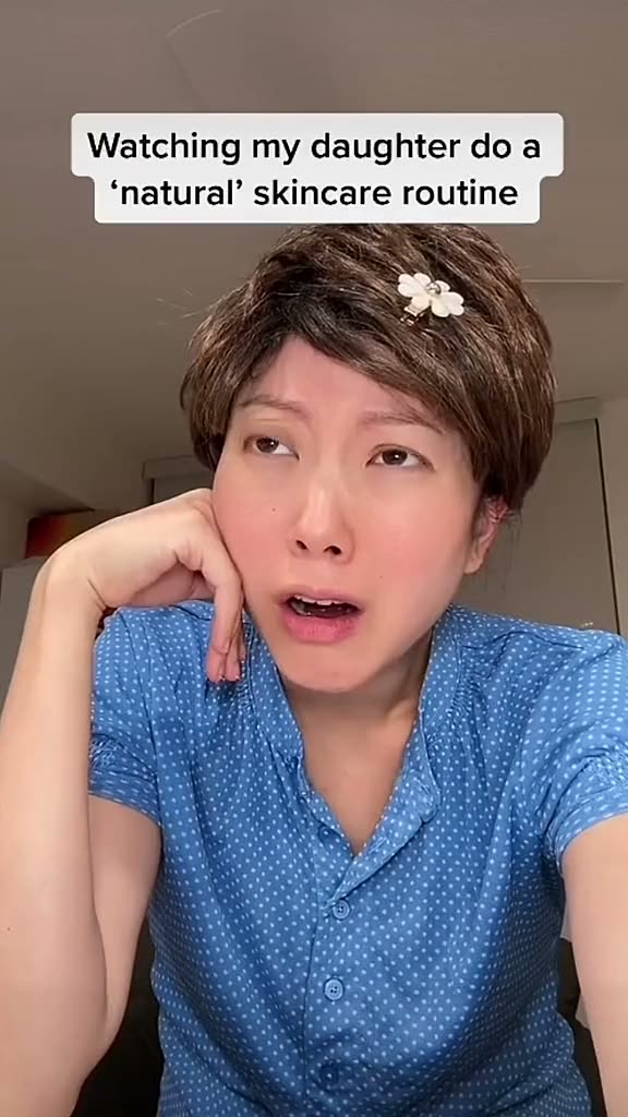 Korean Mom watching daughter do natural skincare routine.mp4