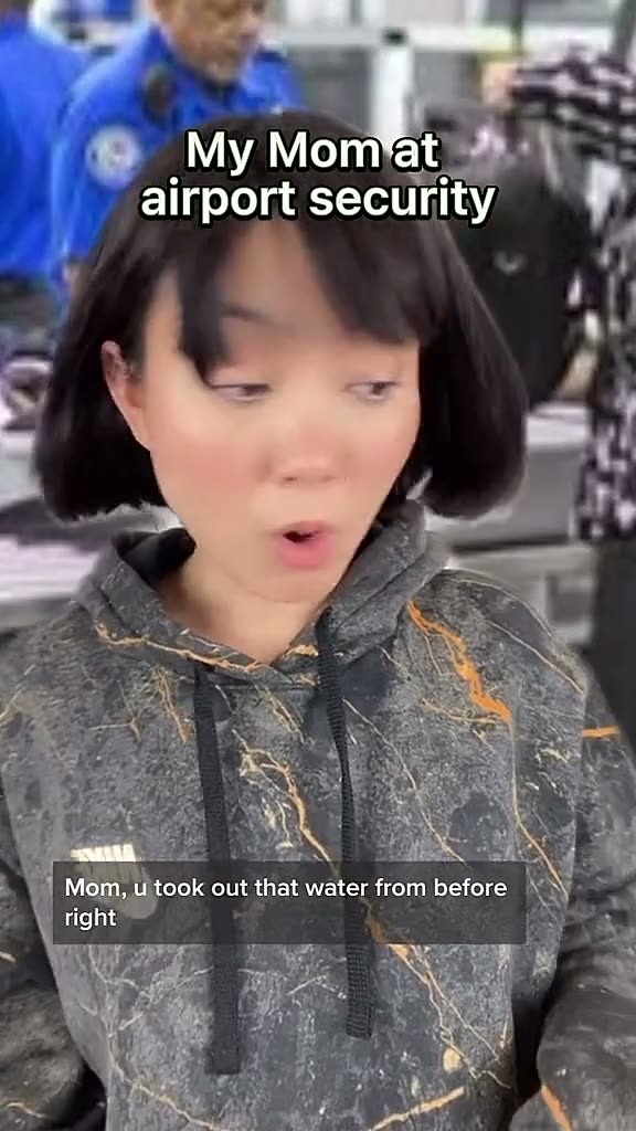 Korean mom at airport security.mp4